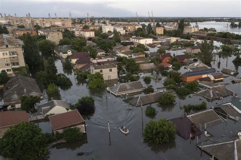 Russia shells Ukrainian city inundated by dam collapse after Zelenskyy visit